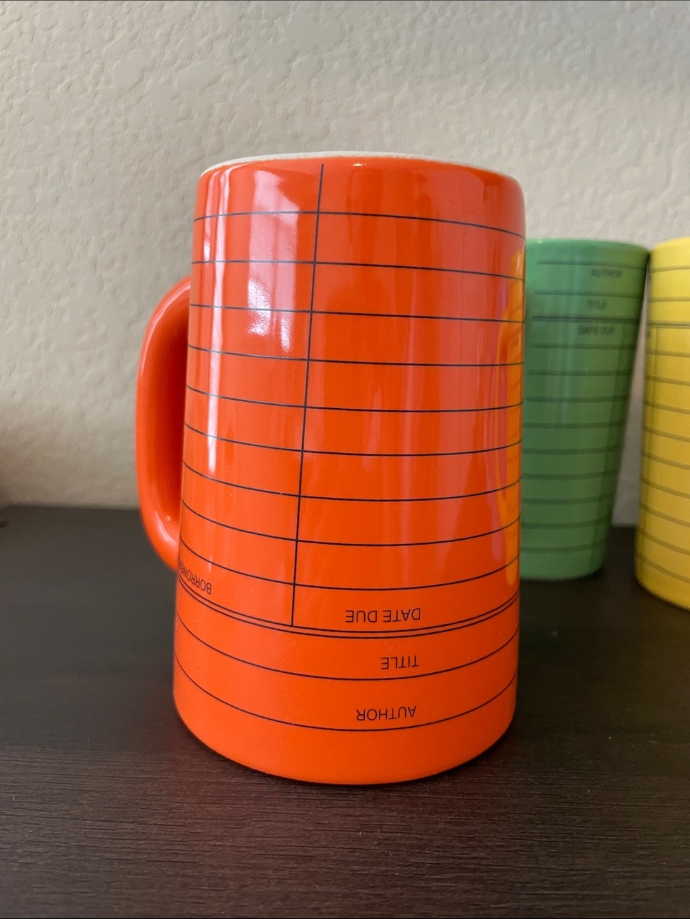 Out of Print Orange, Green, Yellow & Blue Library Card Ceramic Mugs - Picture 3 of 8